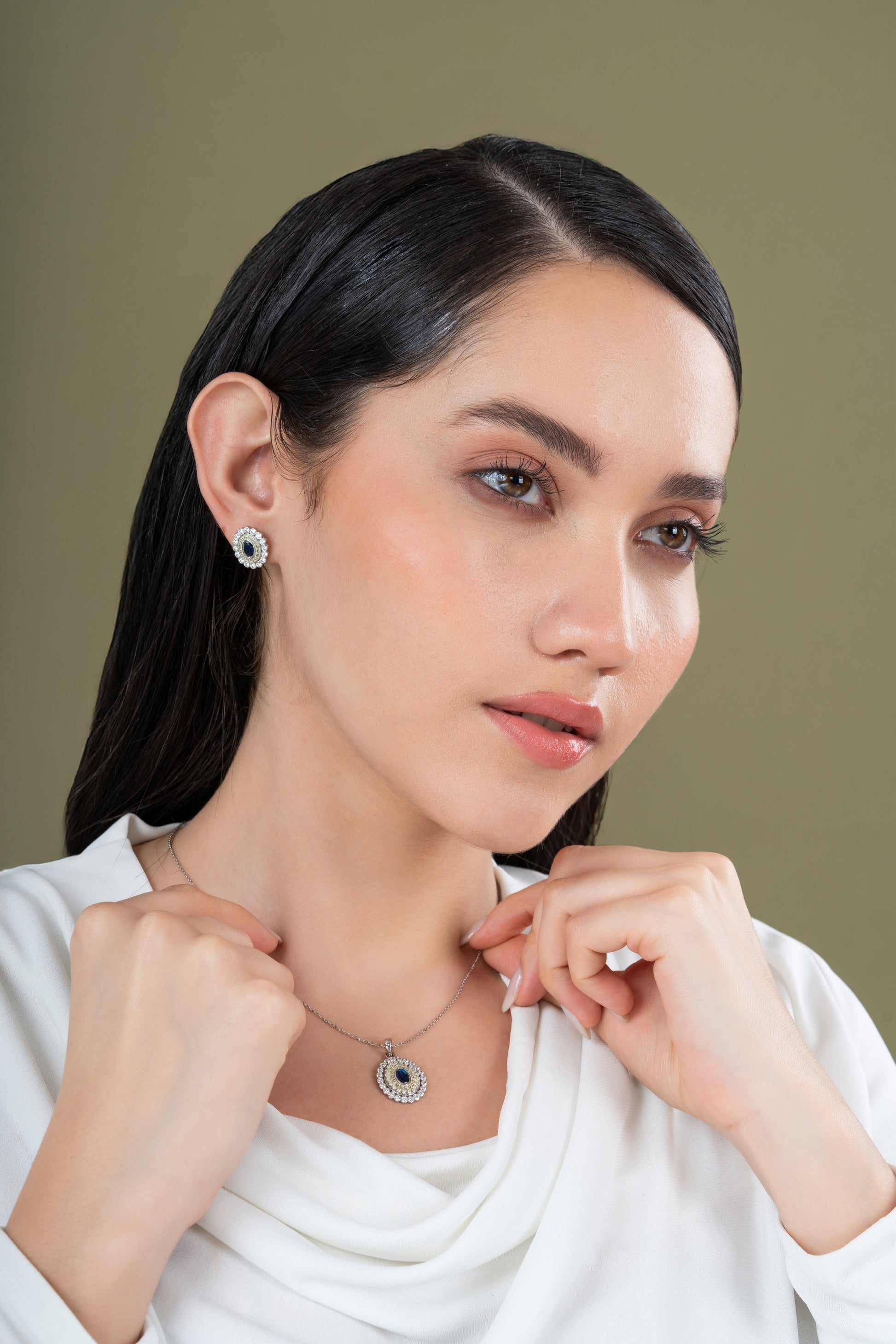 This image features a close-up view of a sophisticated Traditional Kudan Polki Diamond Jewelry Set. The set includes a pair of elegant earrings and a matching necklace, both adorned with intricate polki diamond designs that add a touch of antique charm.